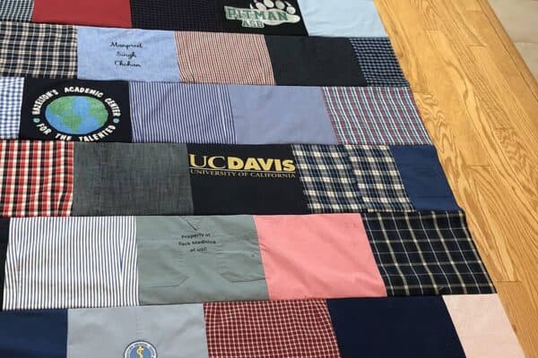 Custom Memory Quilt made out of t-shirts, button-up shirts, and jeans.