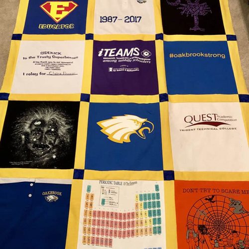 Custom Memory Quilt with modern clean edge. Made from teachers shirts with blue and yellow sashing.